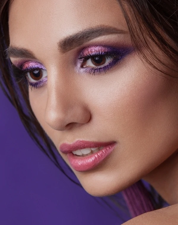 Violet and pink eyeshadow with glossy lips