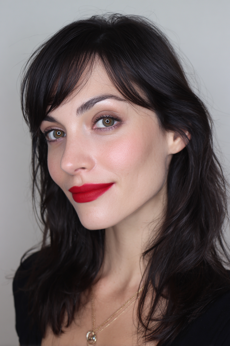 Bold red lips with soft eyeshadow
