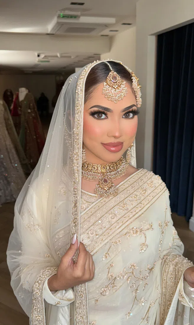 Bridal makeup with soft glow and intricate accessories