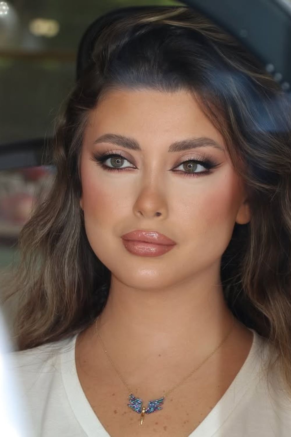 Neutral look with subtle green accents