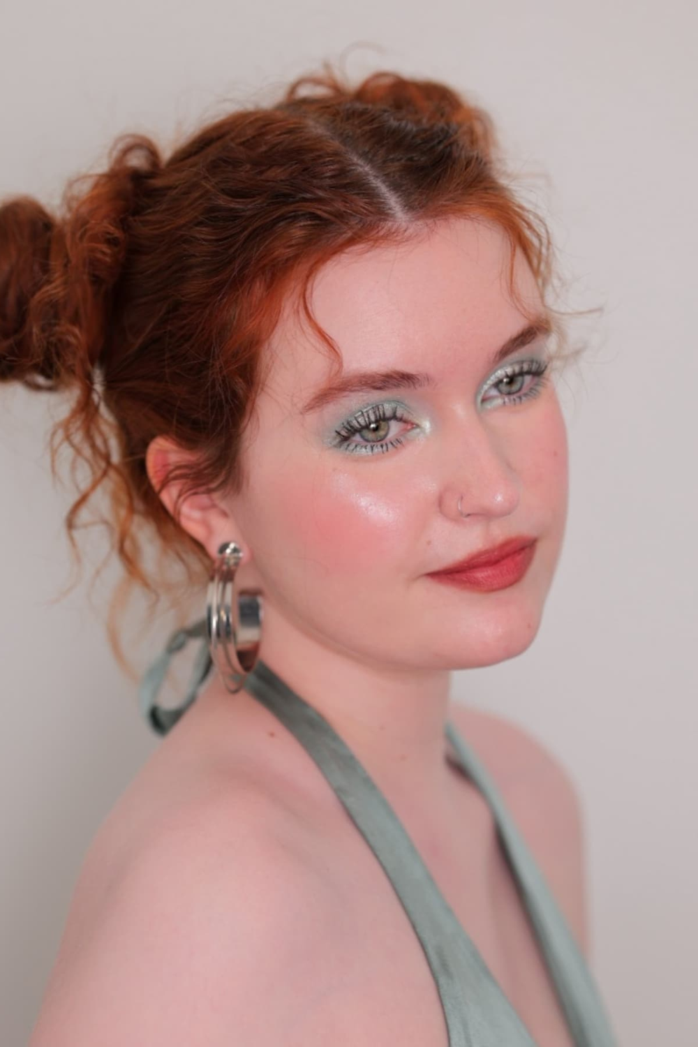 Mint green eyeshadow with rosy cheeks