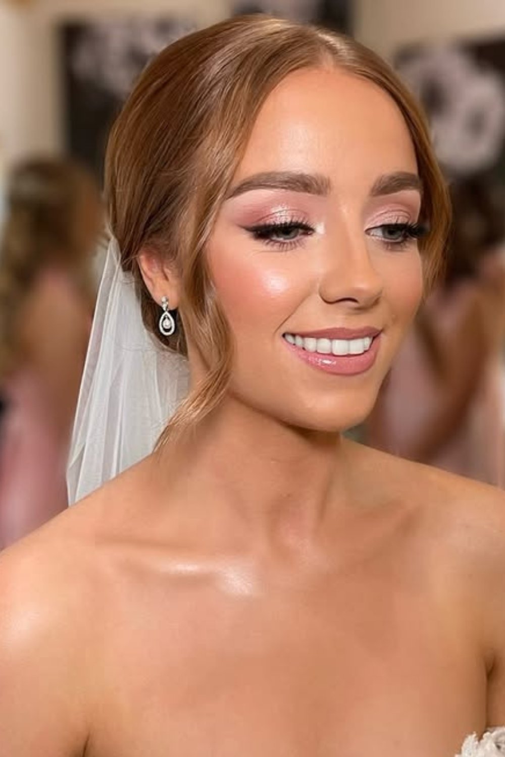 Soft radiant wedding makeup with a rosy glow