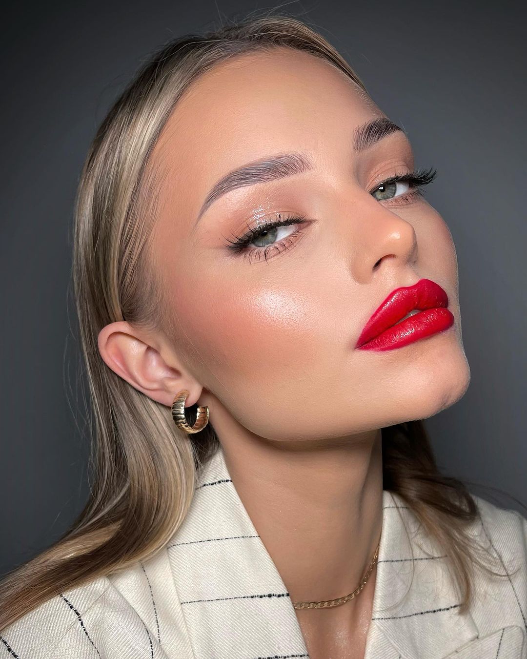 Bold lips with defined brows wedding makeup