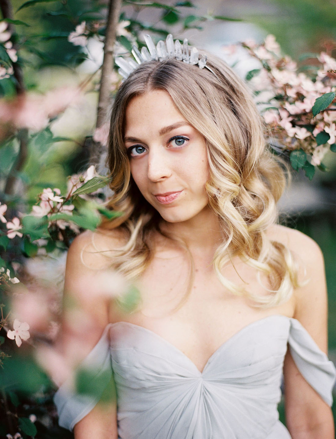 Whimsical romantic wedding makeup with soft curls