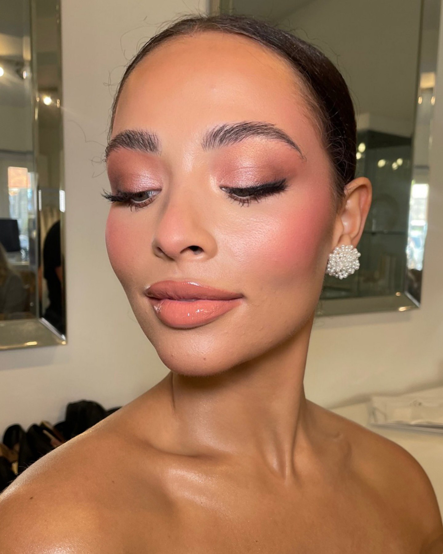 Blushing wedding makeup with radiant glow