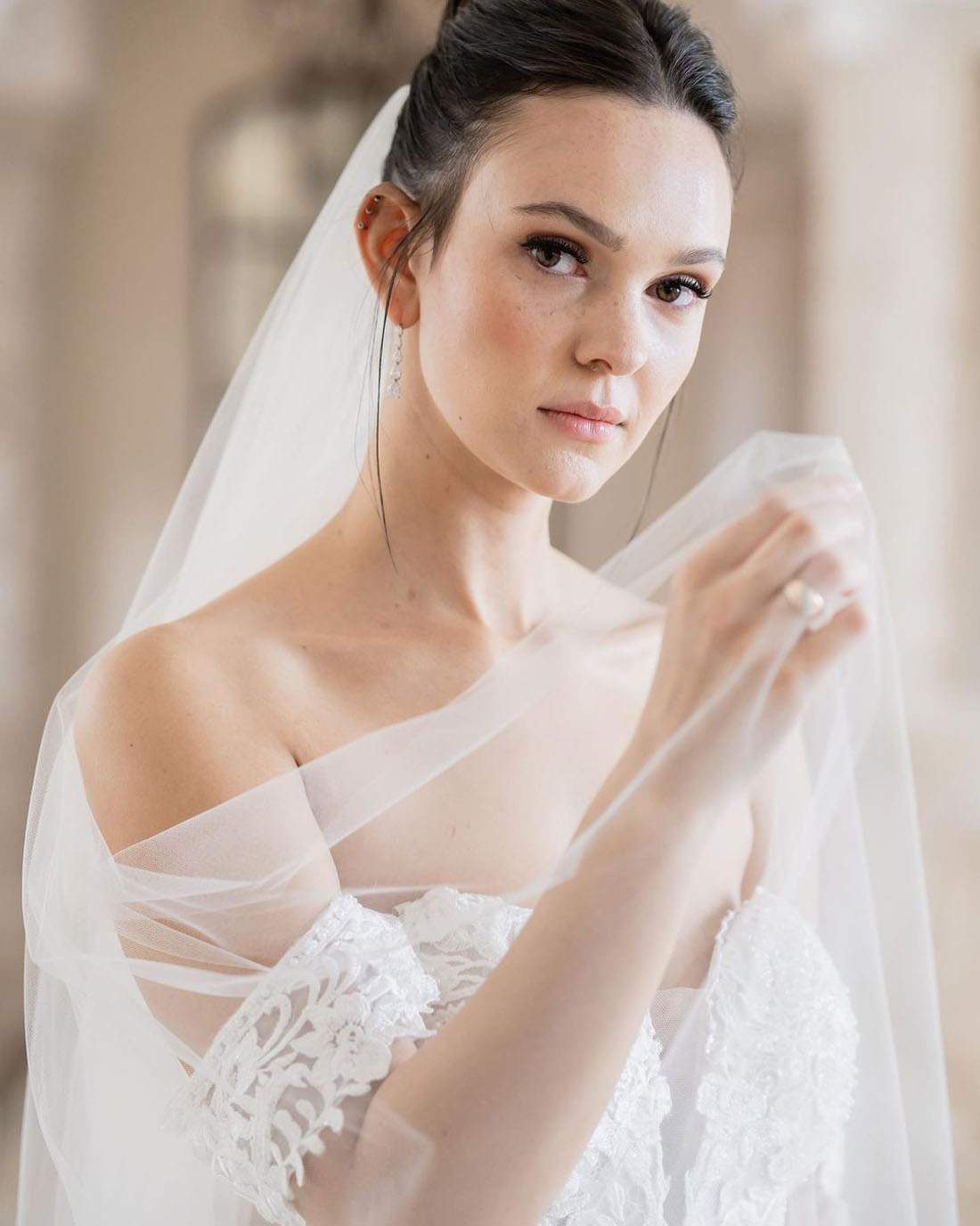 Ethereal wedding makeup with veil