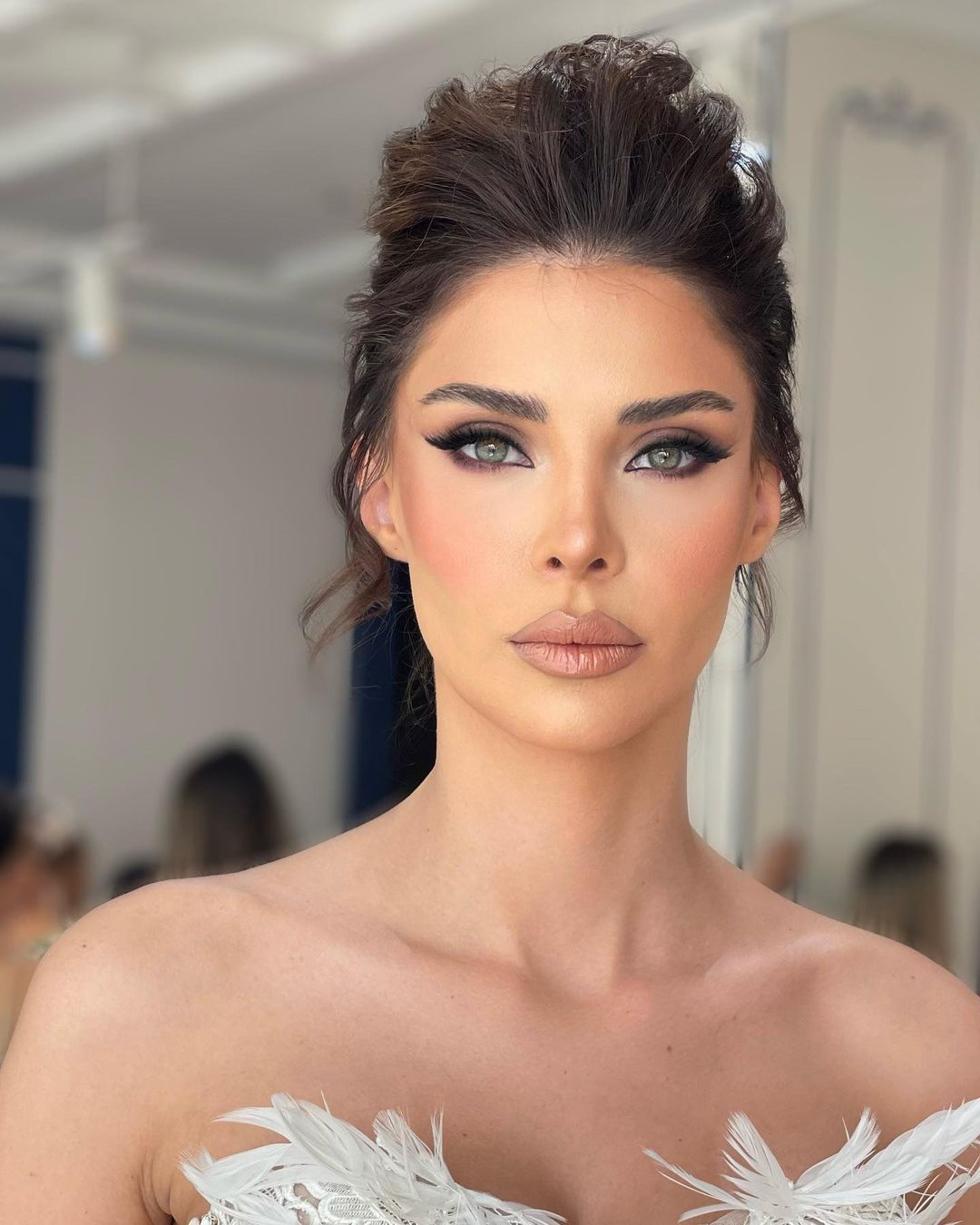 Modern sophisticated wedding makeup with winged liner