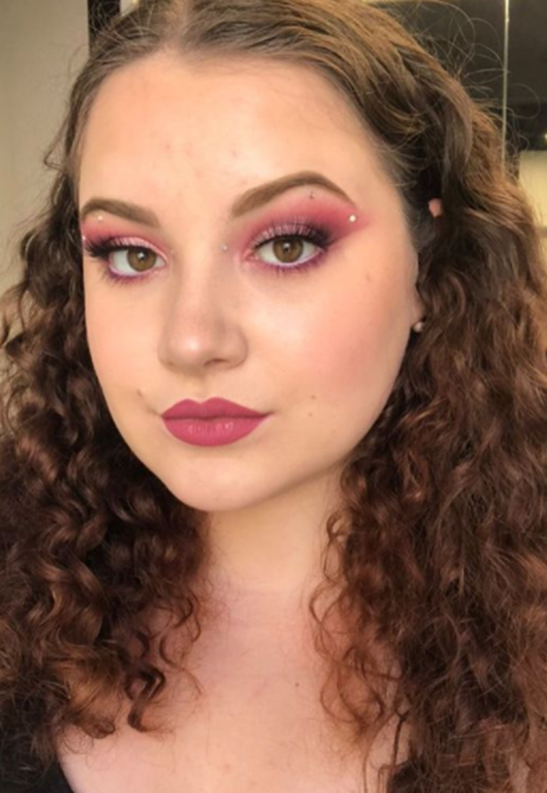 Bold pink eyeshadow with rhinestones