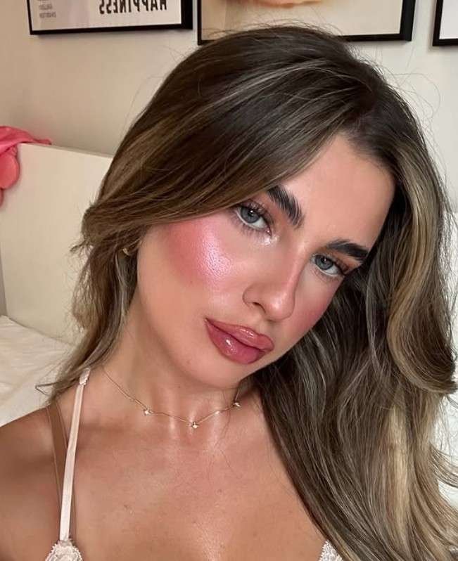 Glowing pink blush with high gloss lips