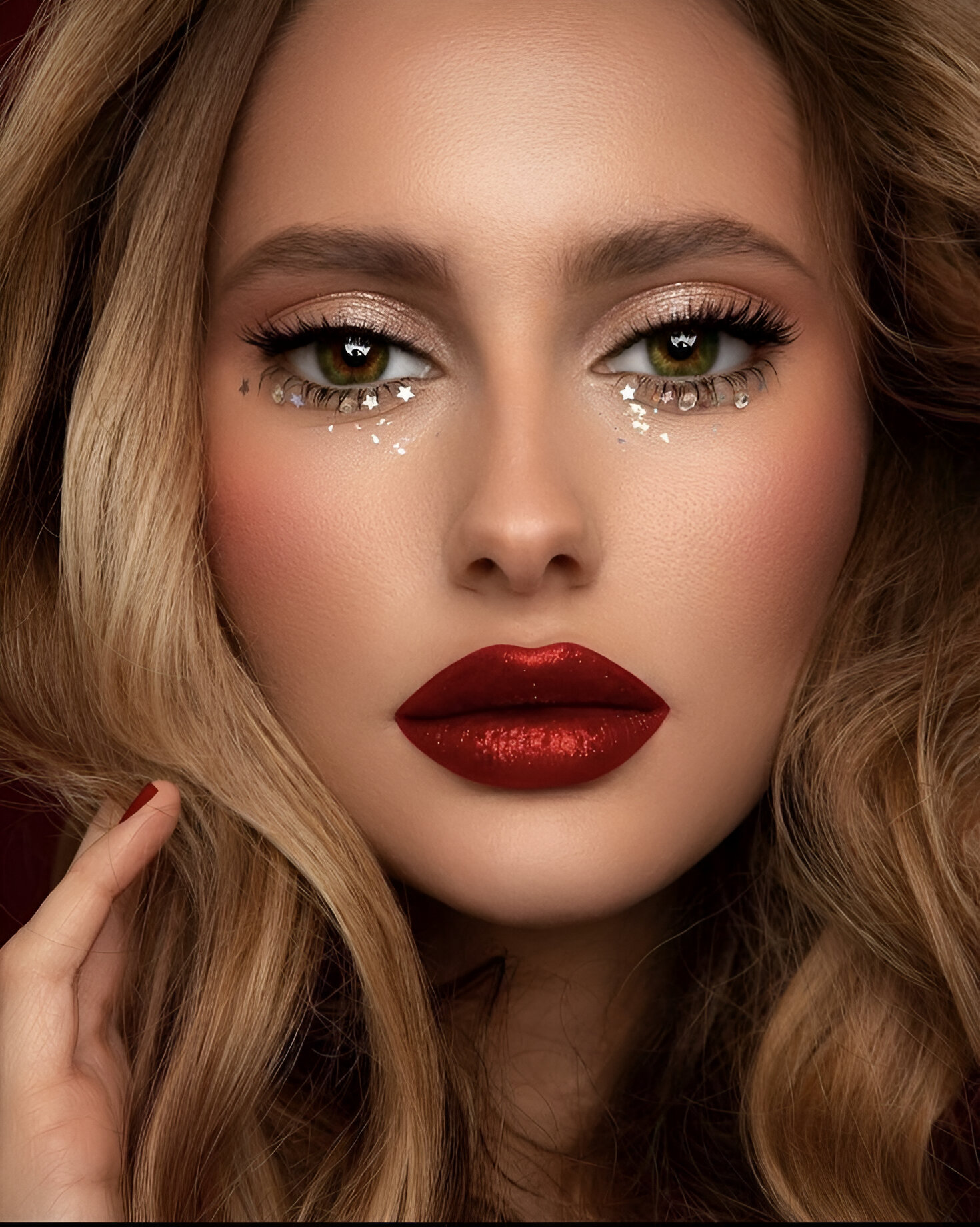 Glamorous red lips with starry glitter eye makeup