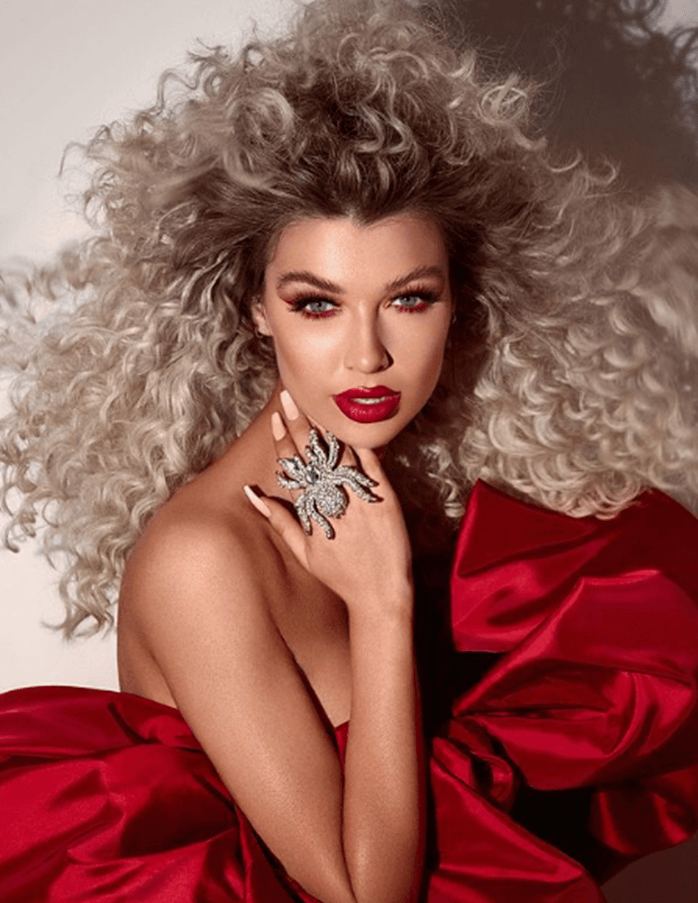 Extravagant red lipstick voluminous curls