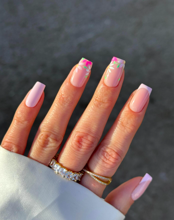Pink French nails with floral accents