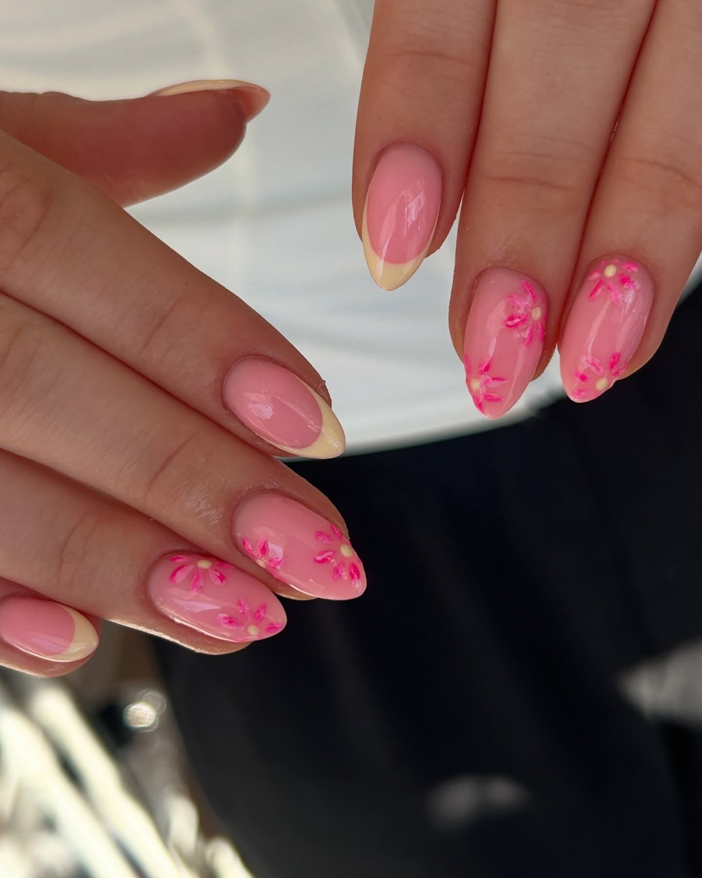 Pink floral nails with nude French tips
