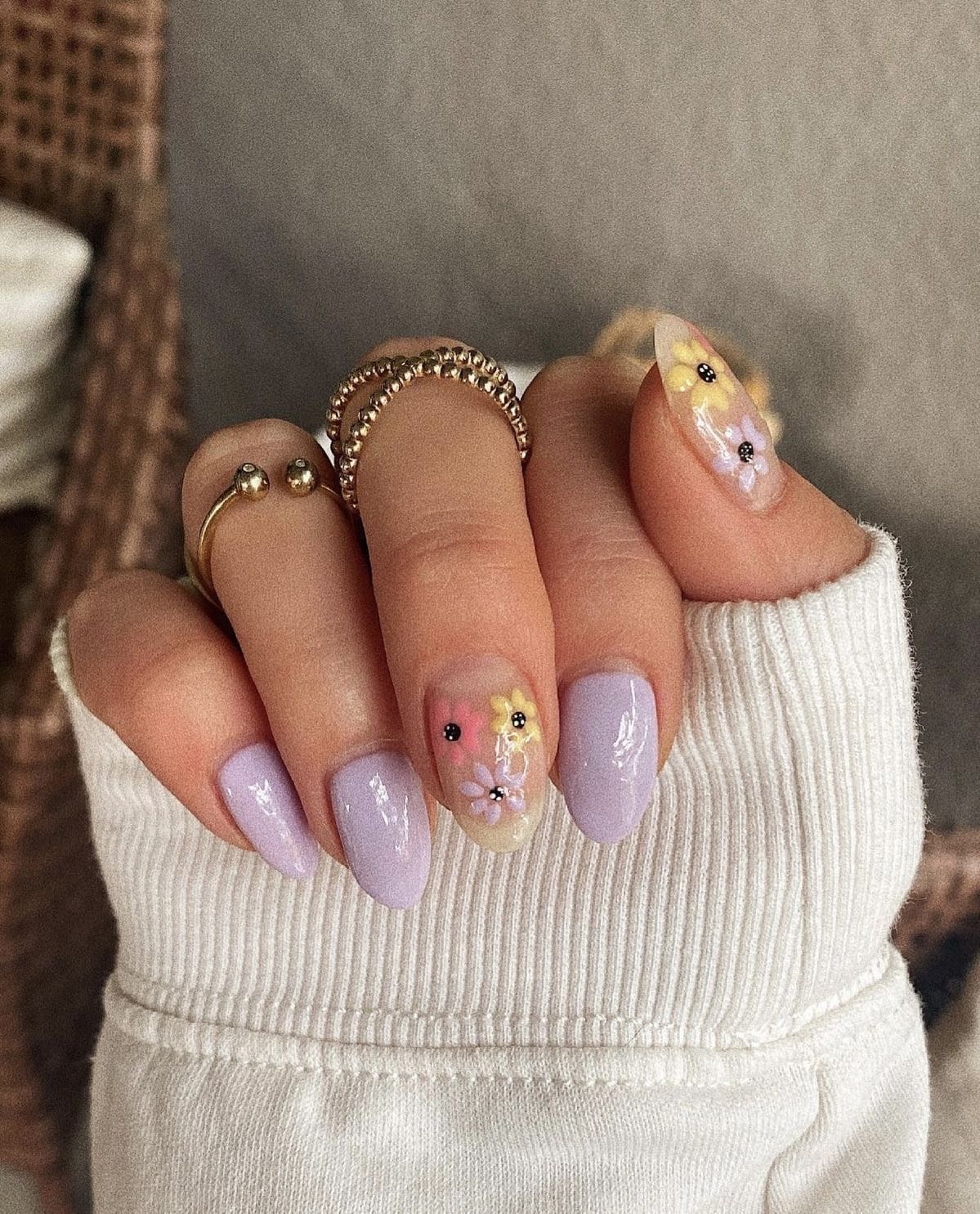 Lavender nails with floral accents