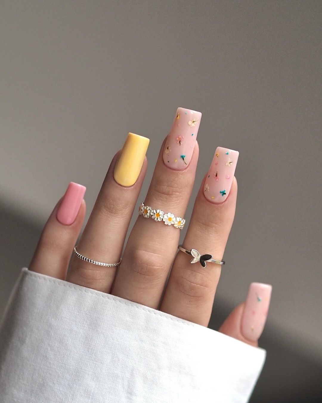 Pastel nails with floral accents