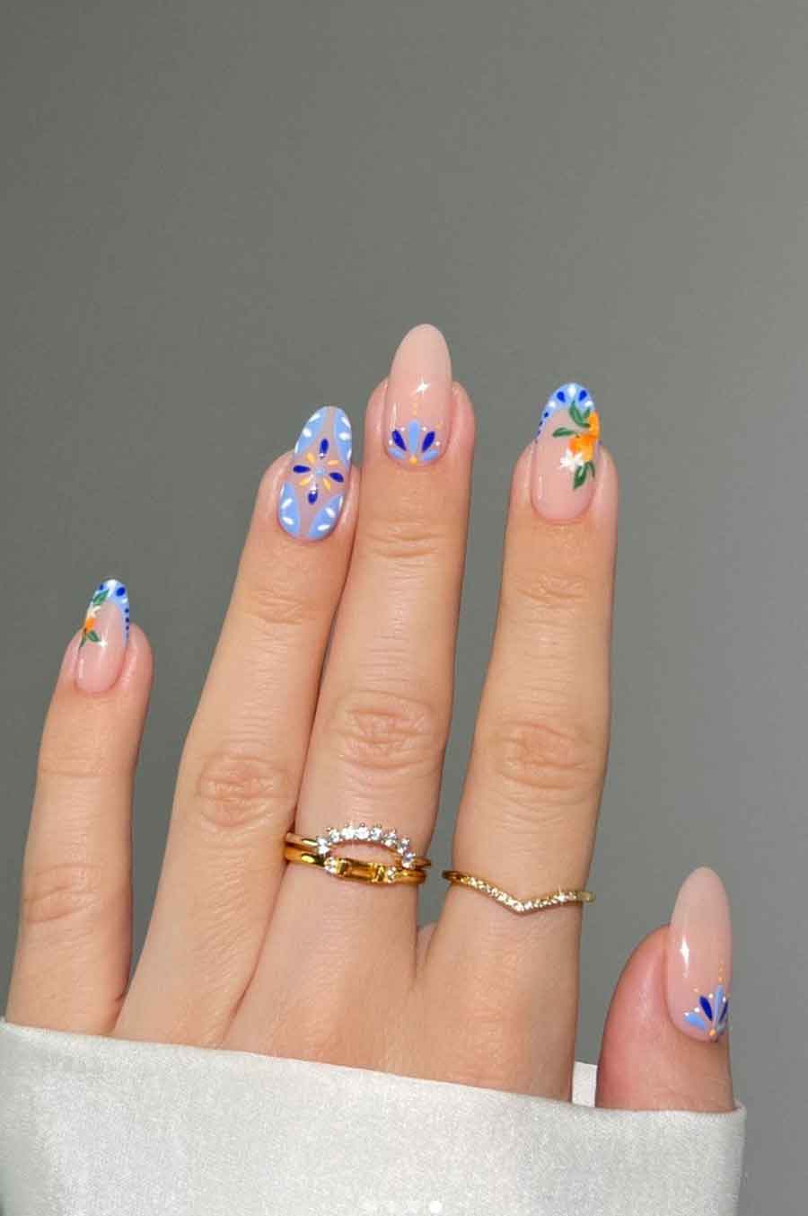 Elegant blue and white French tip nails with modern design