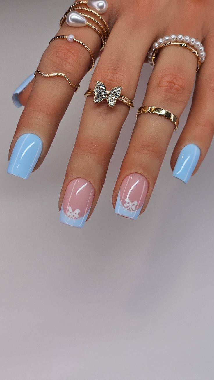 Blue French tips with bow detail on square nails