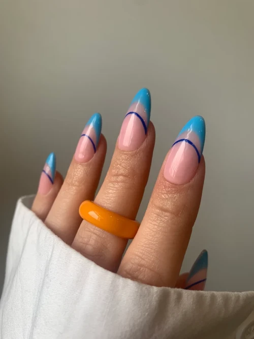 Soft blue ombre French tips on coffin nails