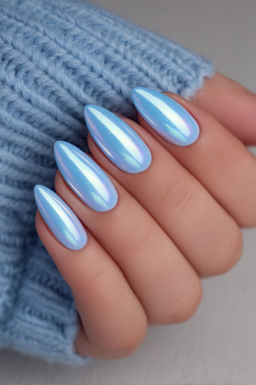 Shimmering ice blue stiletto nails, iridescent finish