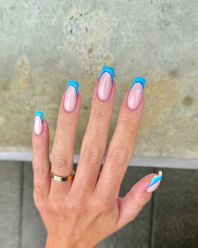 Bright blue French tips with a modern twist