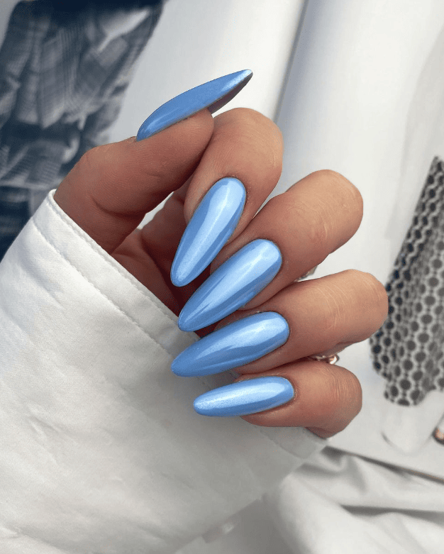 Sky blue stiletto nails with glossy finish
