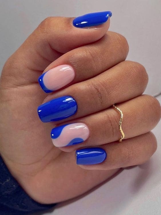 Bright blue wavy French manicure on square nails