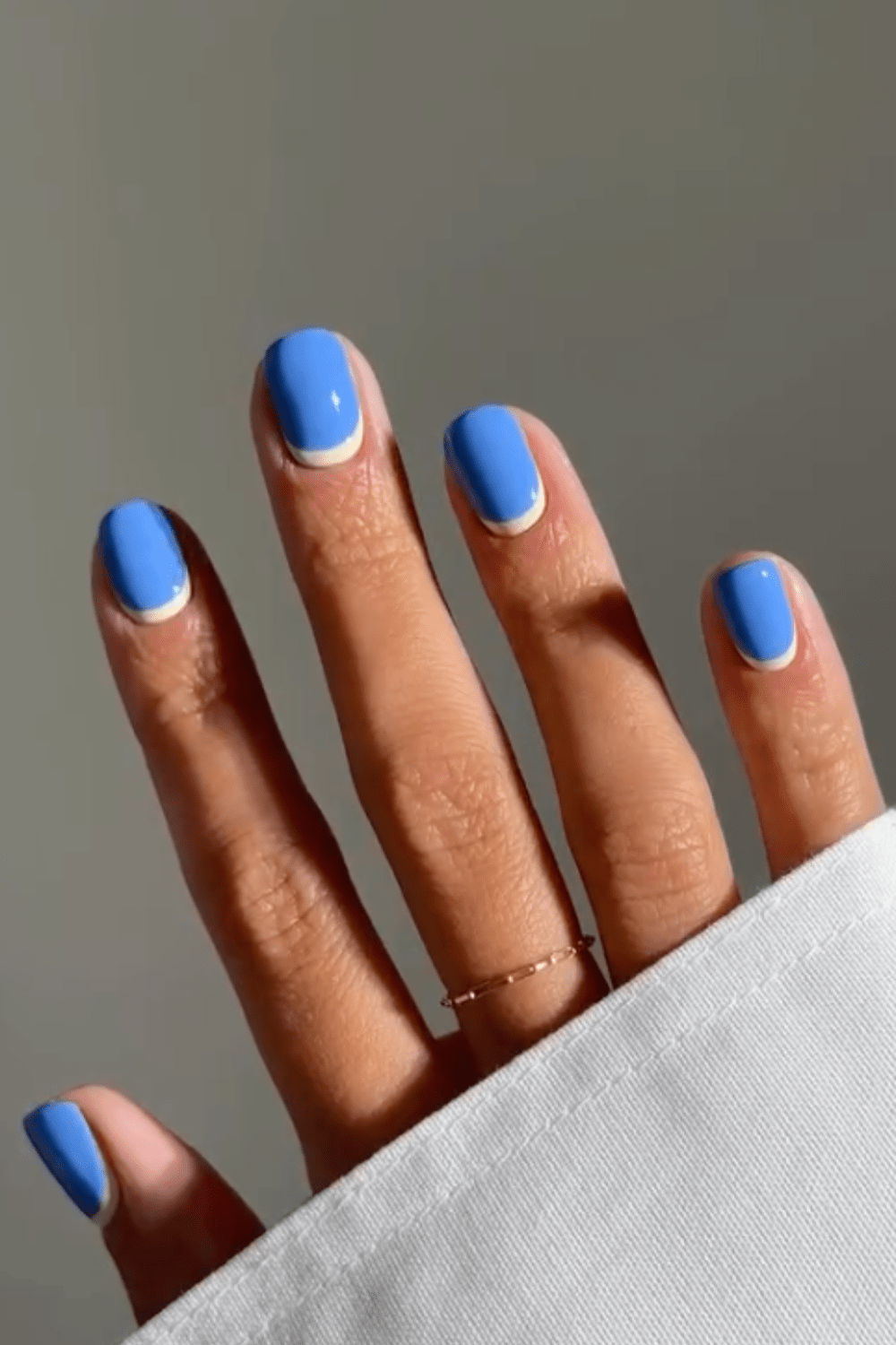 Solid blue nails on short square shape