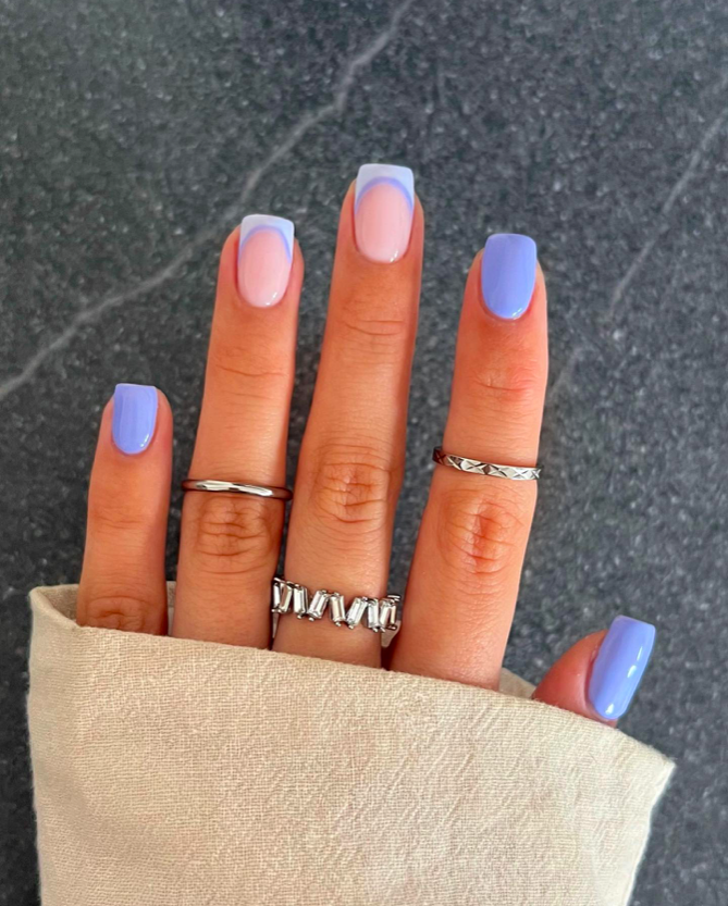 Dual-tone blue and nude nails on medium square nails