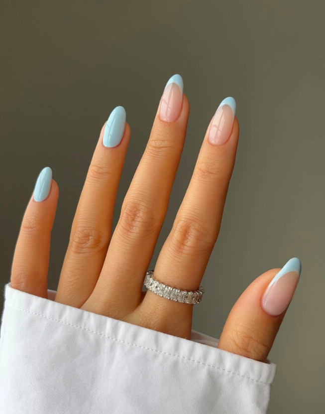 Elegant blue ombre on medium almond nails