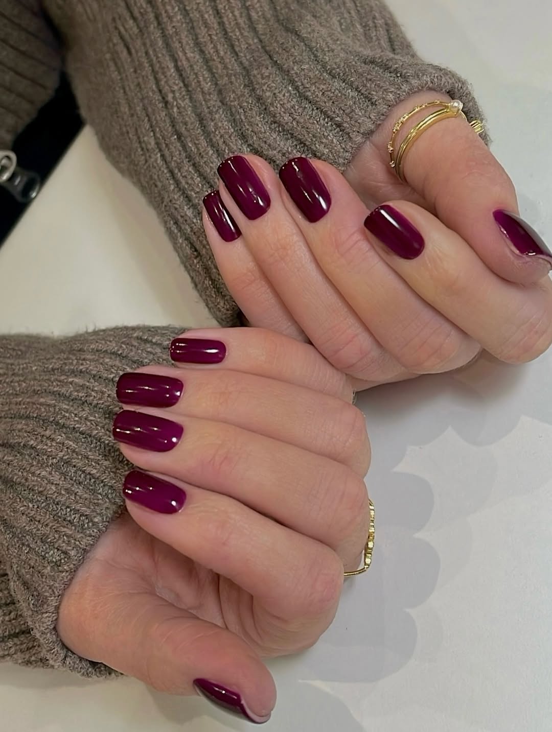 Glossy burgundy nails with a classic finish