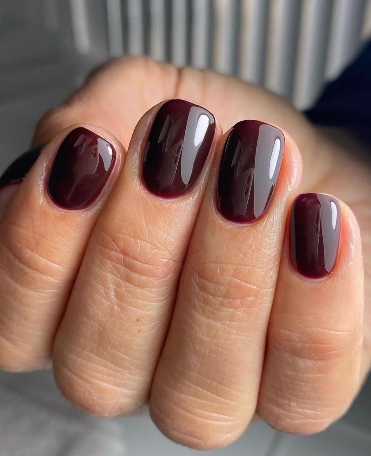 Short glossy deep burgundy nails