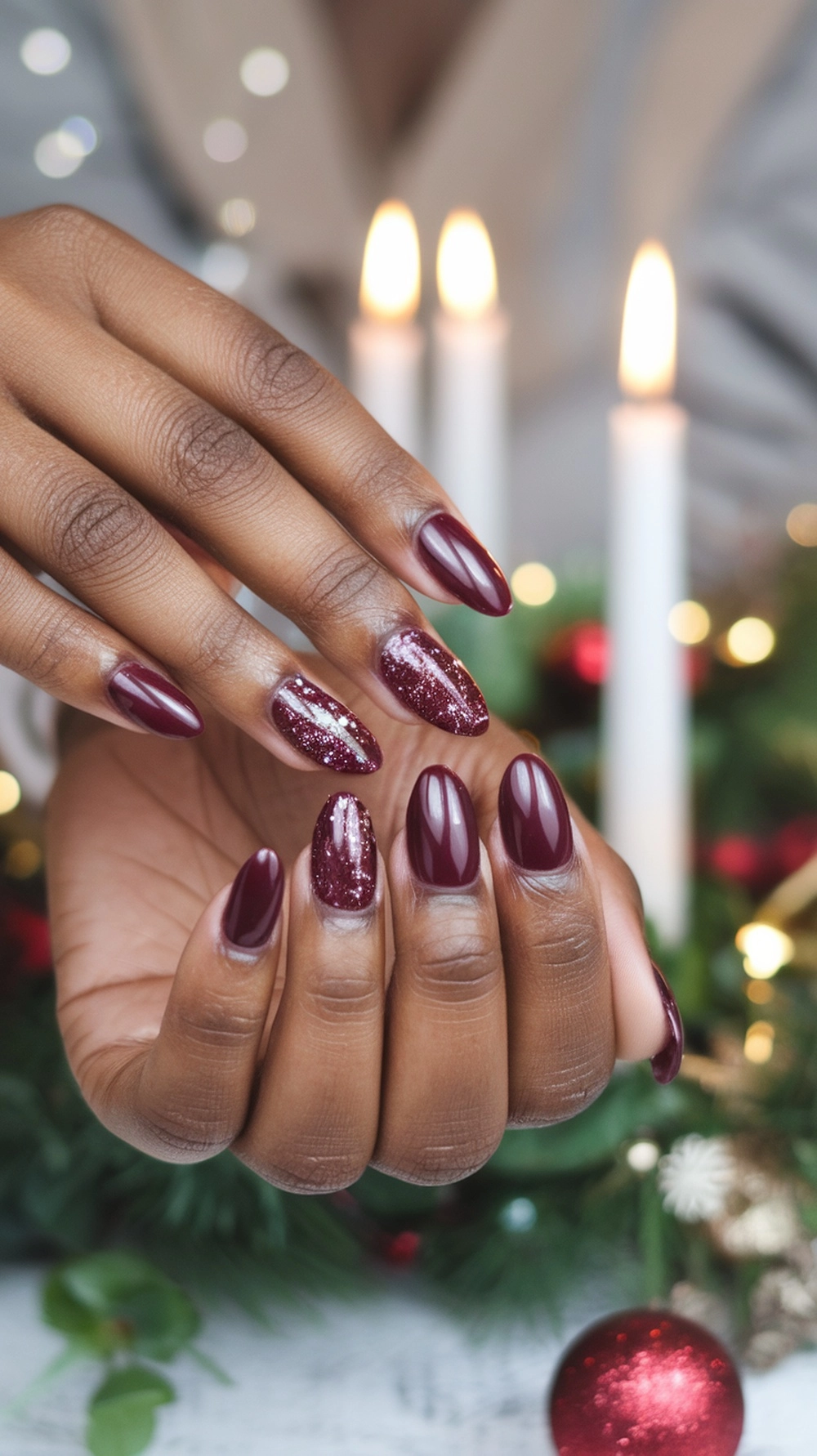 Burgundy nails with glitter accents