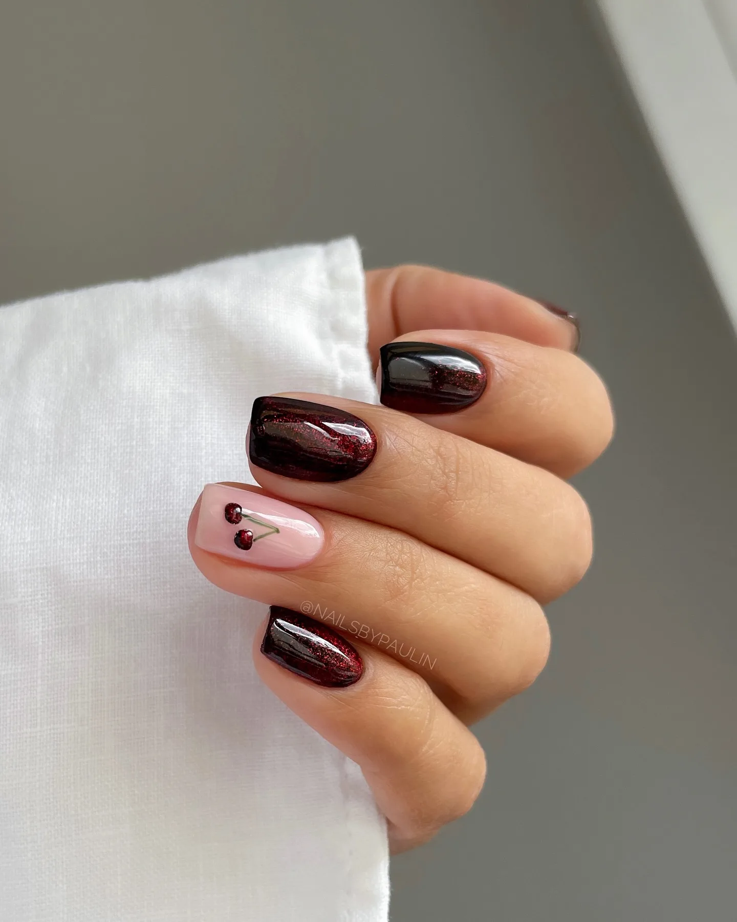 Burgundy and nude square nails with accents