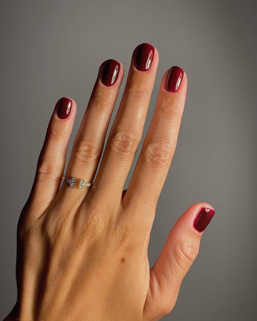 Short glossy burgundy nails