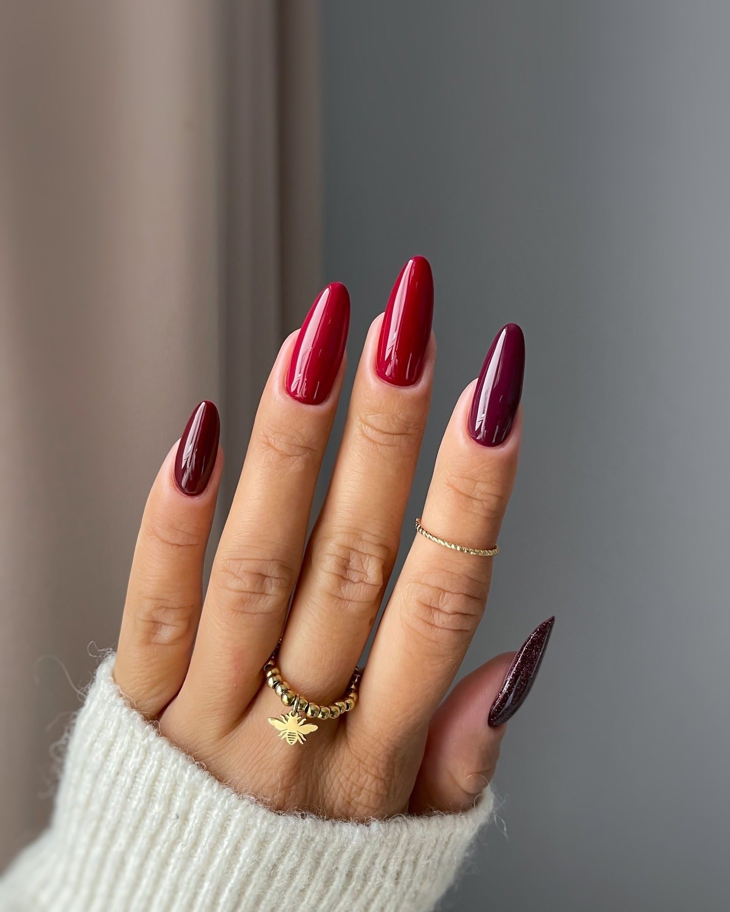 Gradient burgundy nails with glossy finish