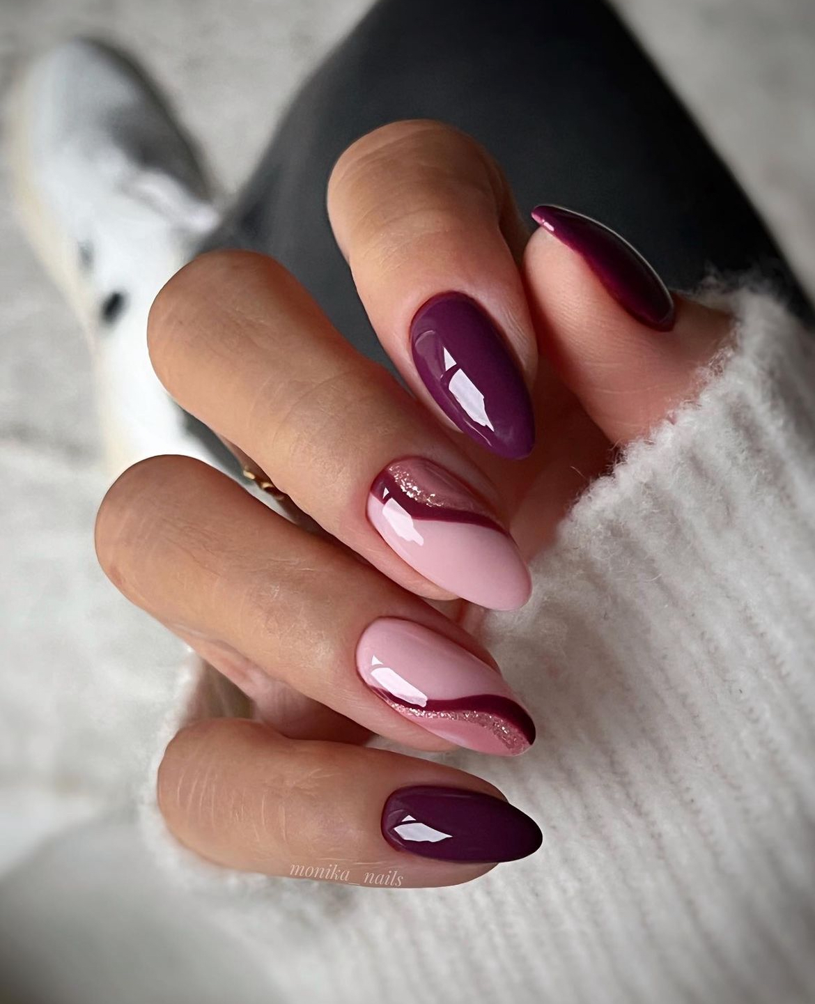 Burgundy and pink almond nails with glossy finish