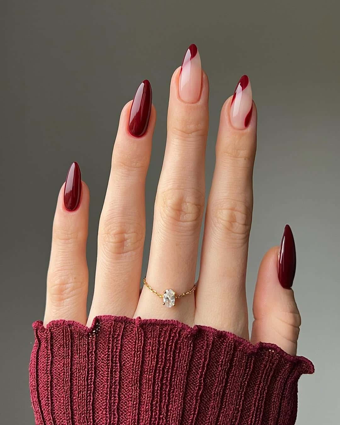 Almond nails with cherry red French tips
