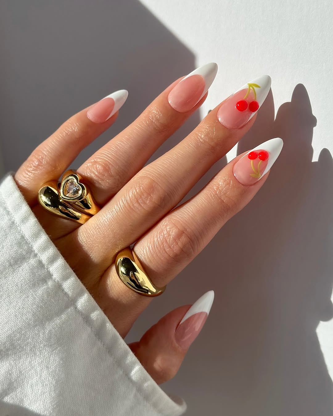 Cherry nail art with playful design