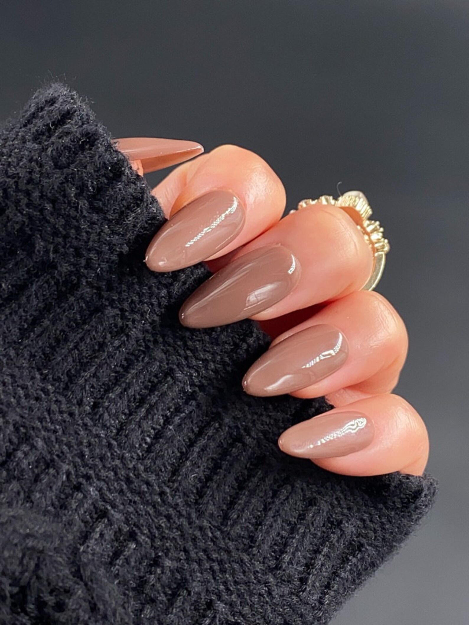 Glossy almond nails in cherry red