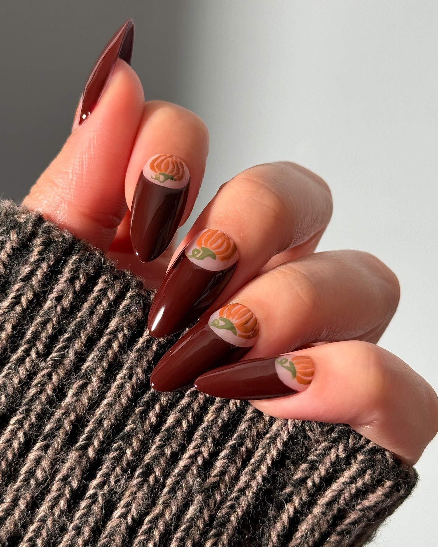 Cherry nails with pumpkin accents