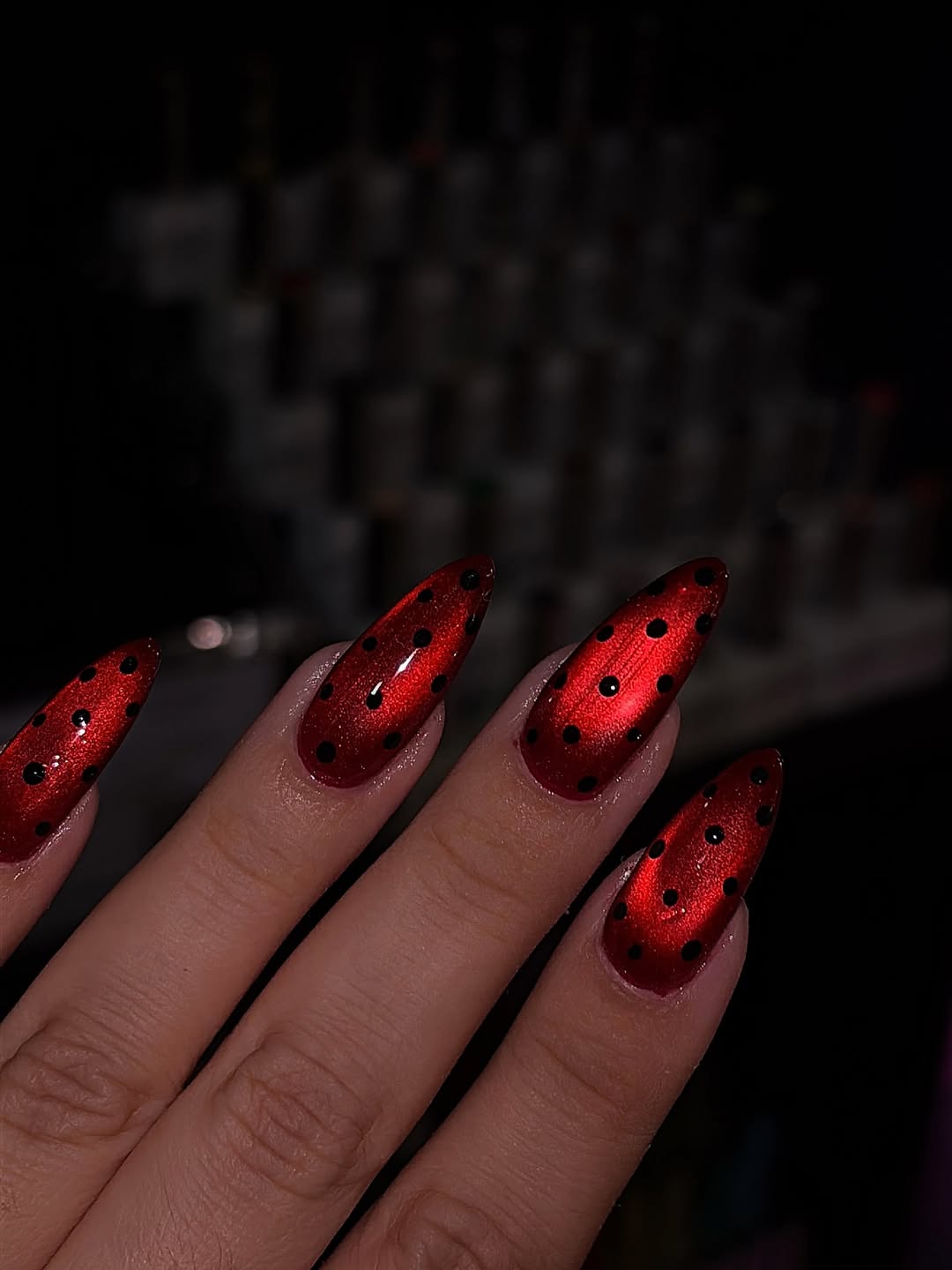 Cherry red nails with black dots