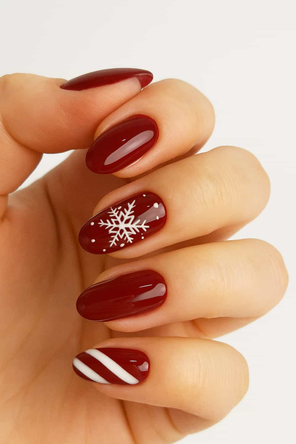 Cherry nails with snowflake design