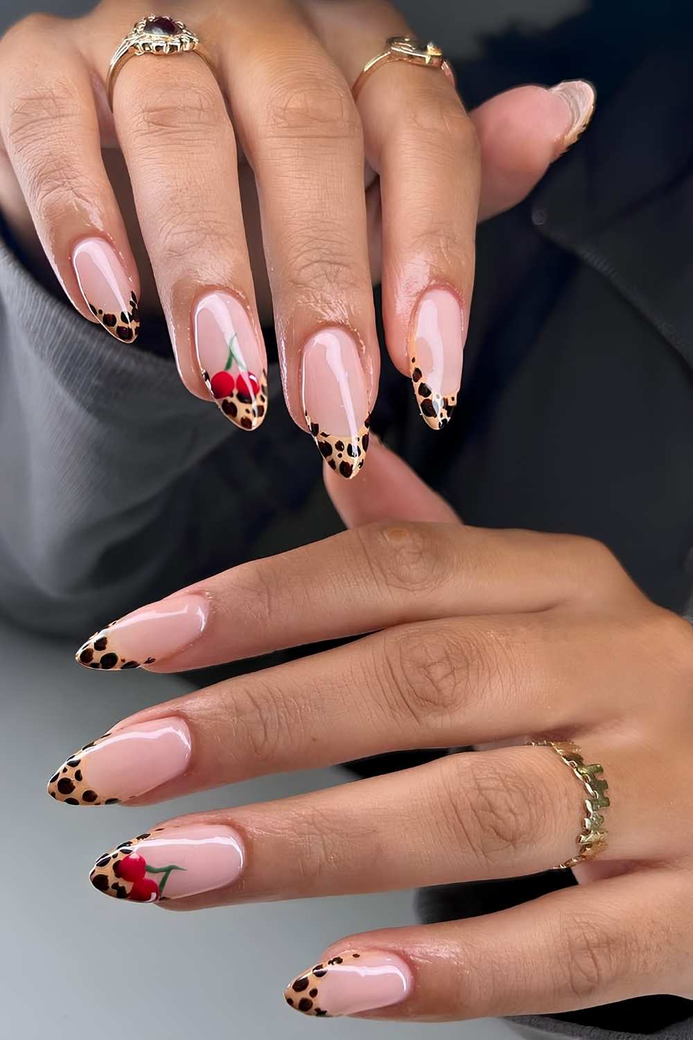 Leopard print and cherry accents, Pinterest nail art, playful nails