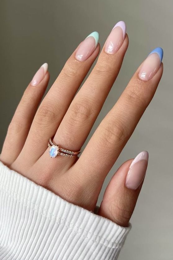 Pastel French tips on almond nails, Pinterest nail art, playful elegance