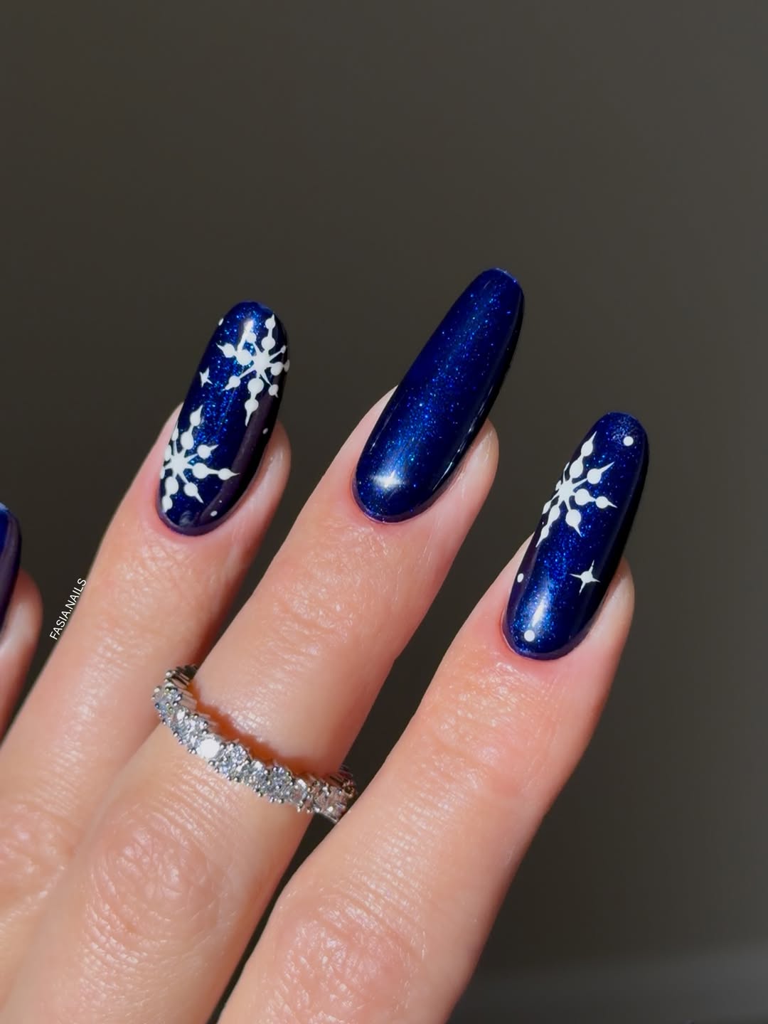 Galaxy blue nails with snowflake art, Pinterest nail art, winter wonderland
