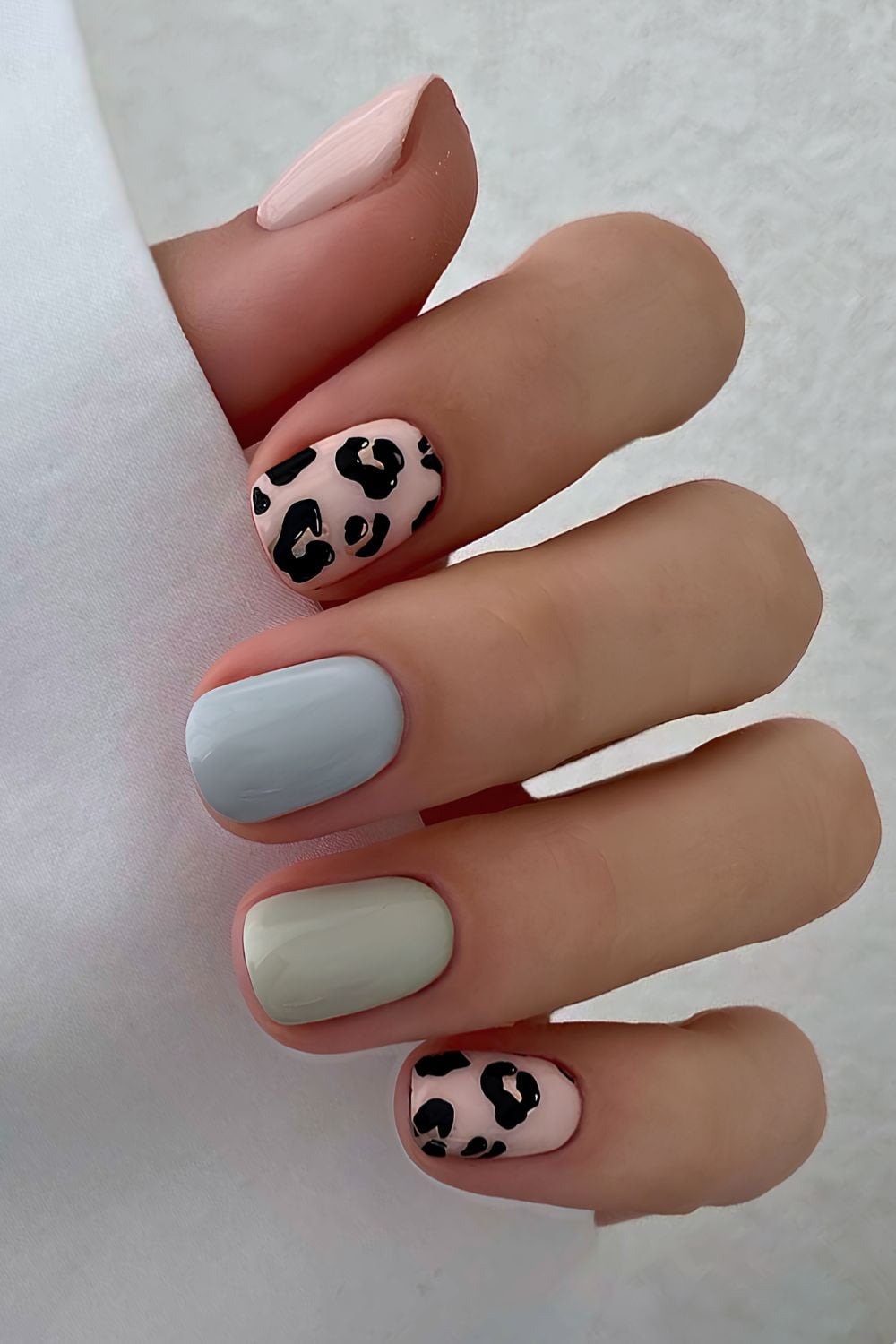 Leopard print and pastel nails, Pinterest nail art, edgy and fun