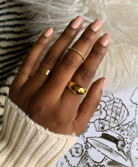 Nude nails with high-gloss finish.