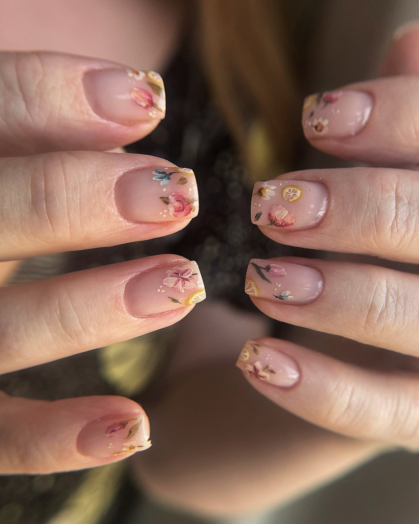 Floral design on short square nails.