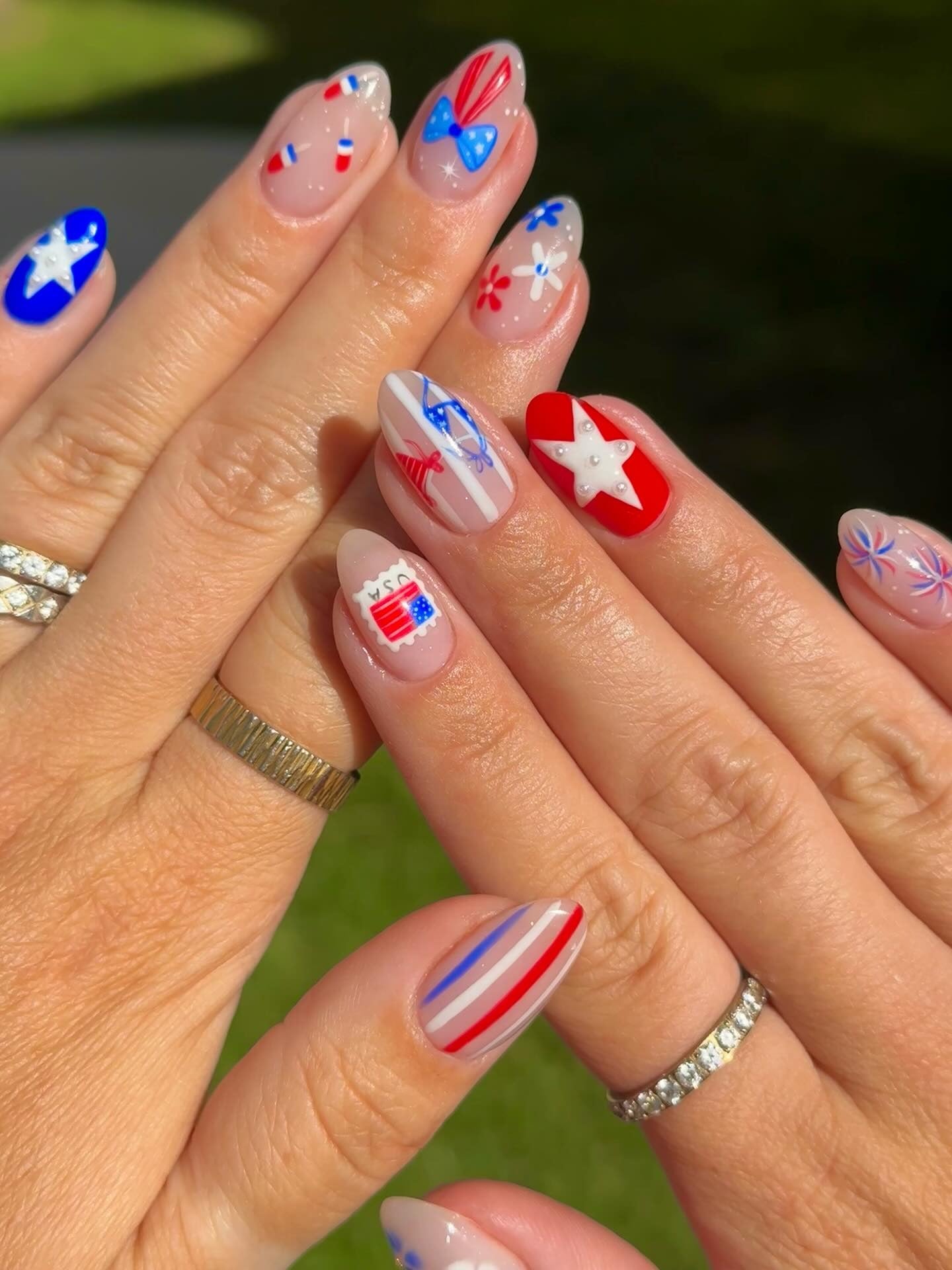 Red, white, and blue patriotic nail art.