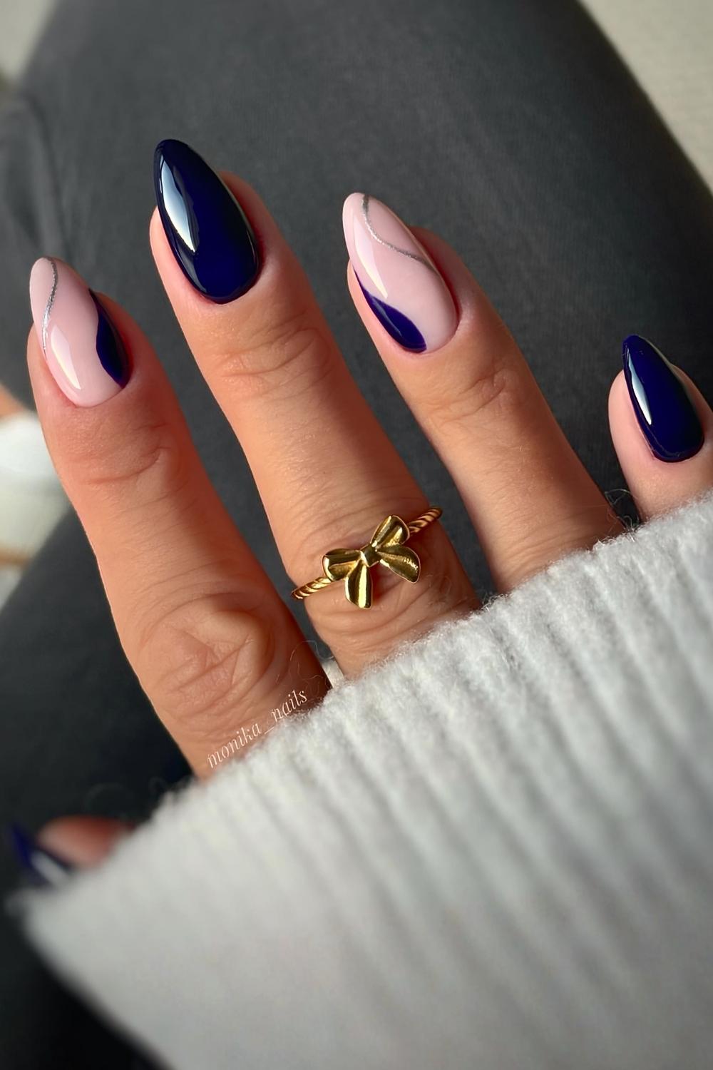 Navy and pink nails with a chic contrast.